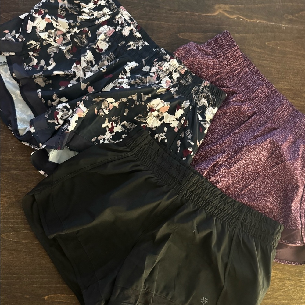 Athleta size small- good condition
Floral, Purple, and Black Women's Shorts Set